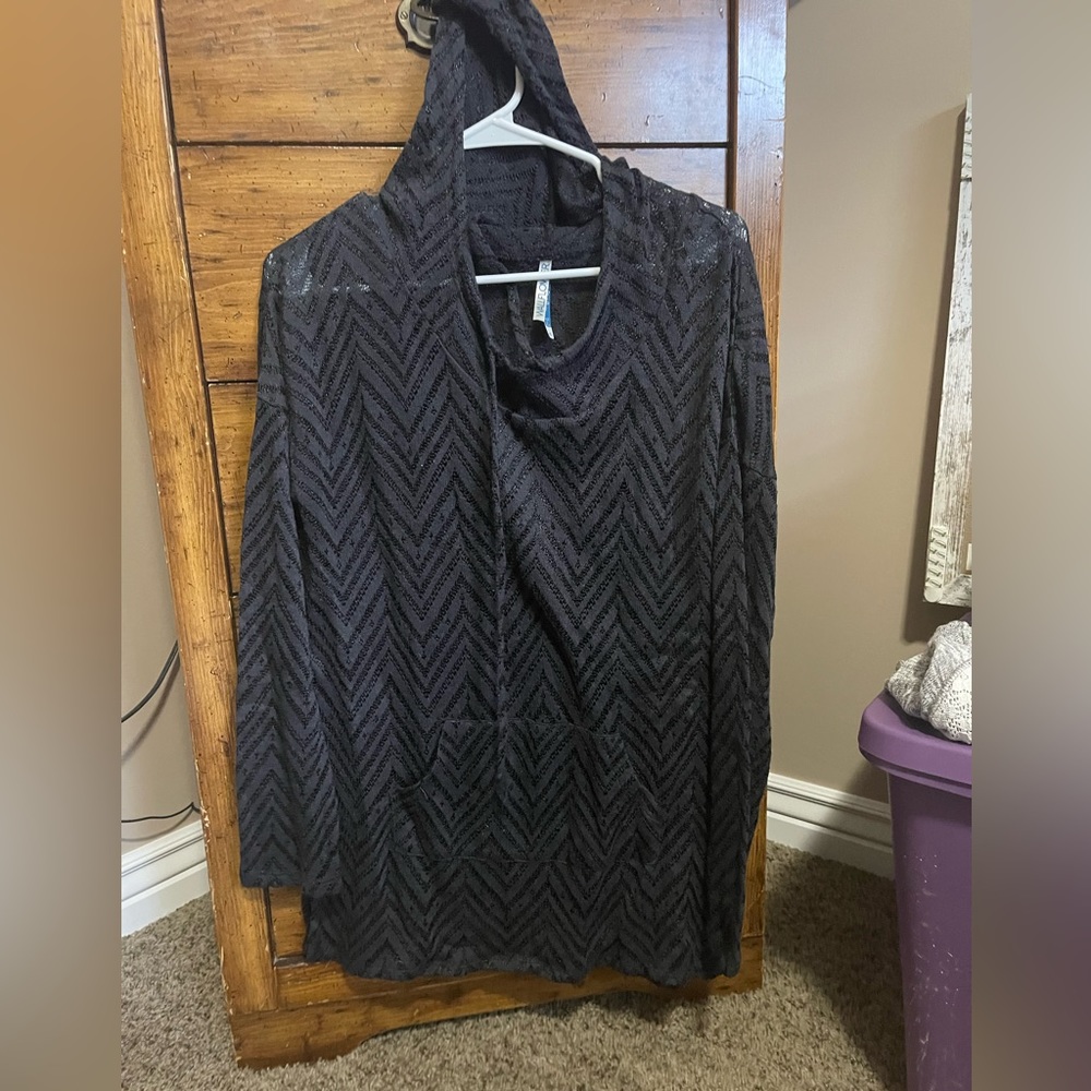 Lightly worn hooded top